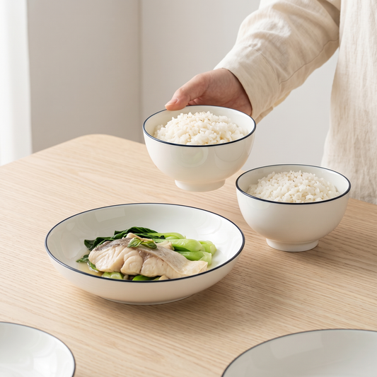 Jingdezhen bone china tableware on a pale oak table